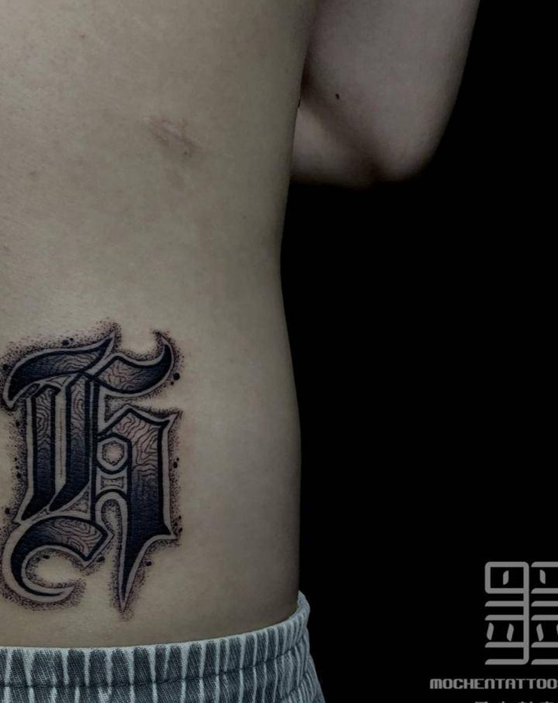 现场原创纹身图片_腰部花体字原创纹身图案