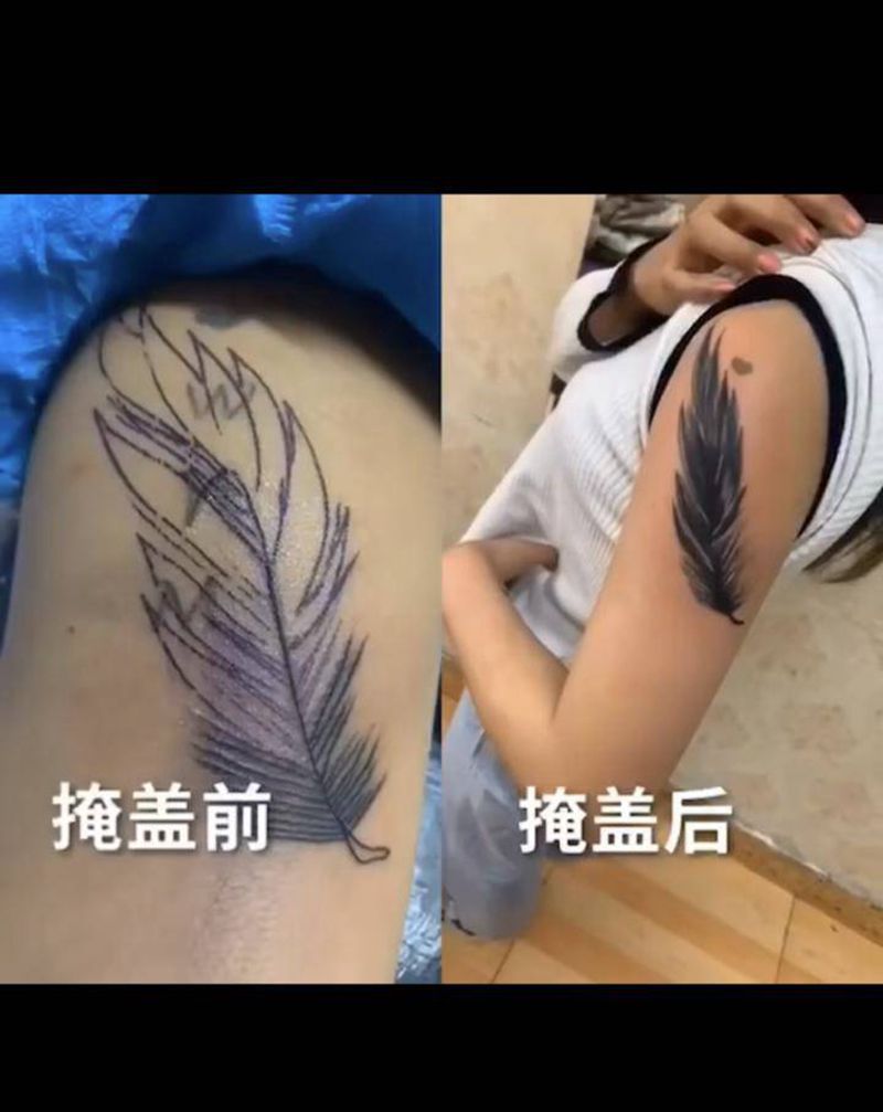 羽毛掩盖纹身图片_手部纹身图案