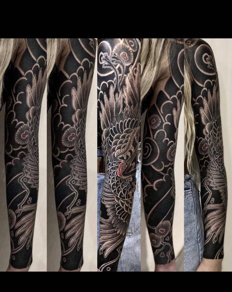 老传统仙鹤纹身图片_手臂老传统点刺仙鹤纹身图案