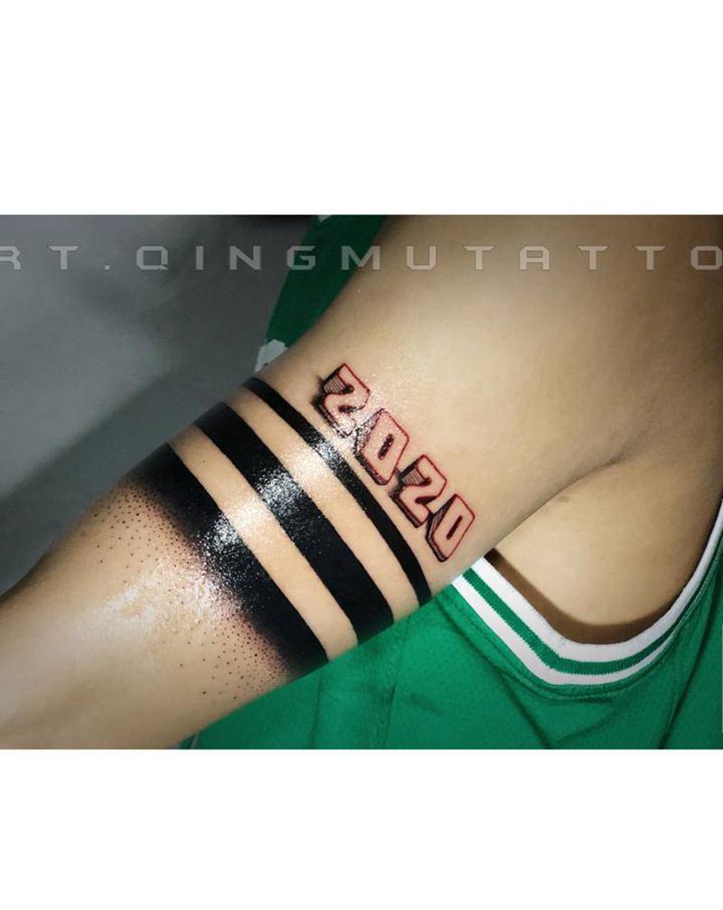 臂环遮盖纹身图片_手臂几何点刺纹身图案