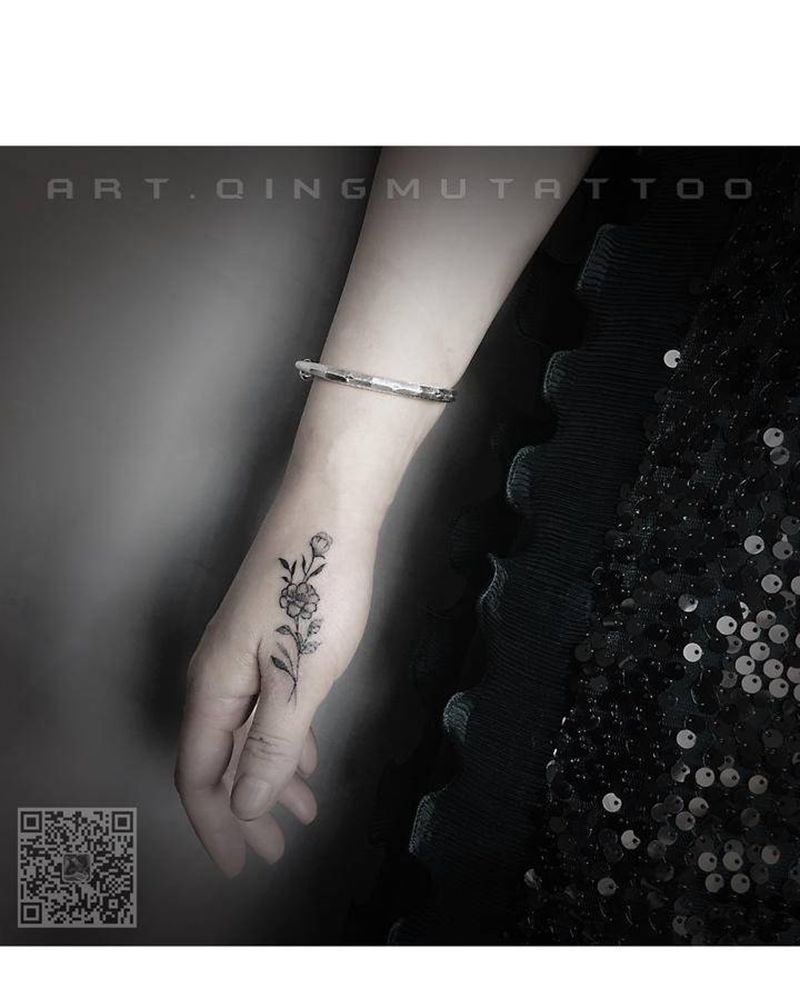 素花遮盖印记纹身图片_手部纹身图案