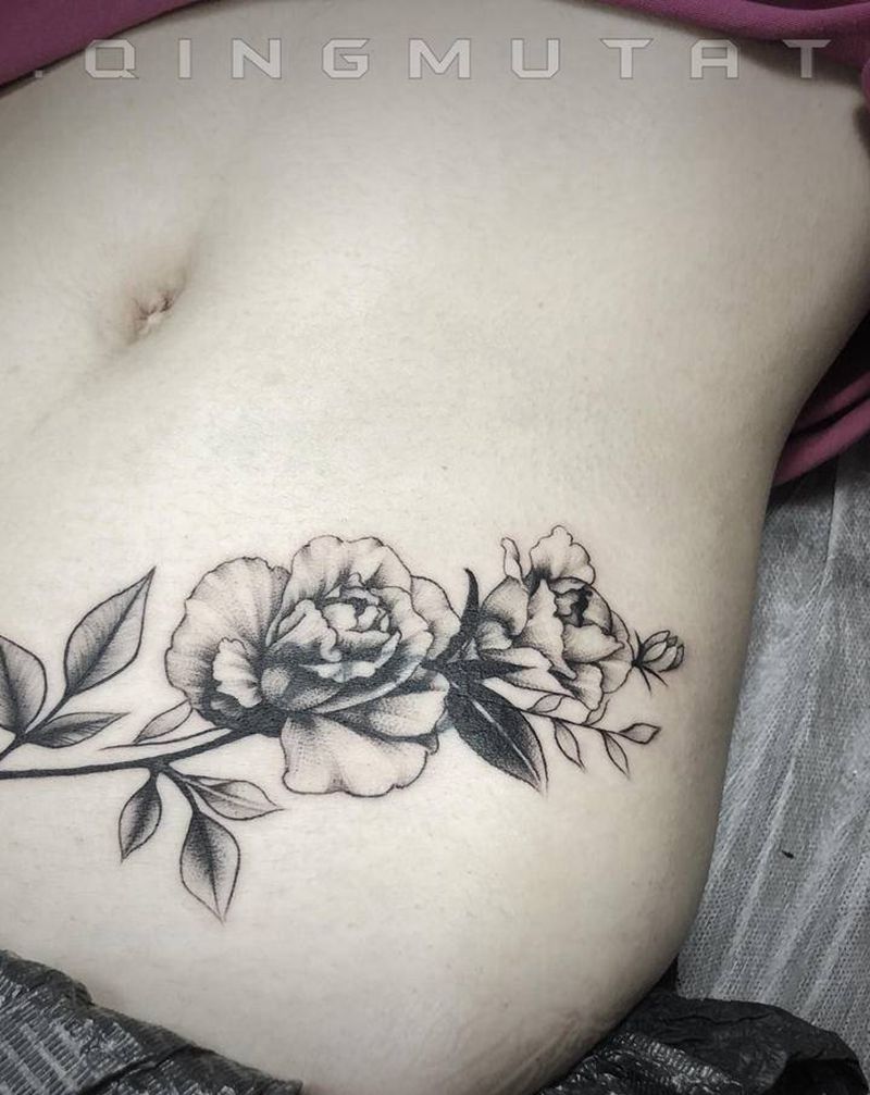 旧纹身遮盖纹身图片_腰部纹身图案