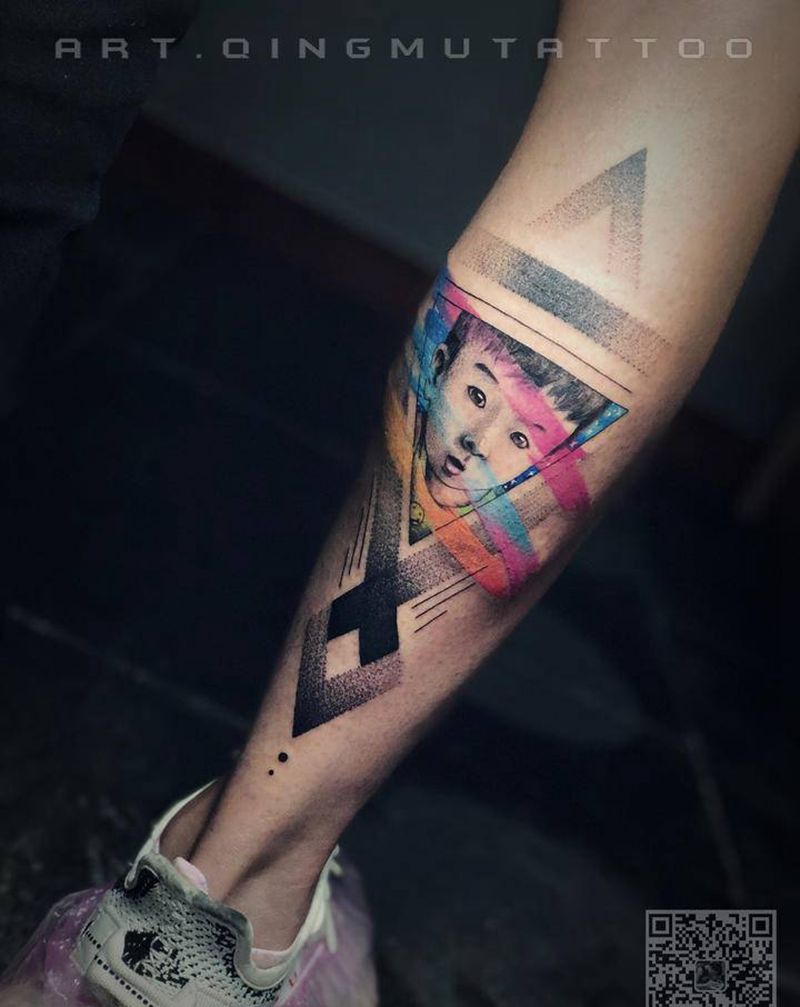 小腿肖像纹身图片_腿部几何点刺纹身图案