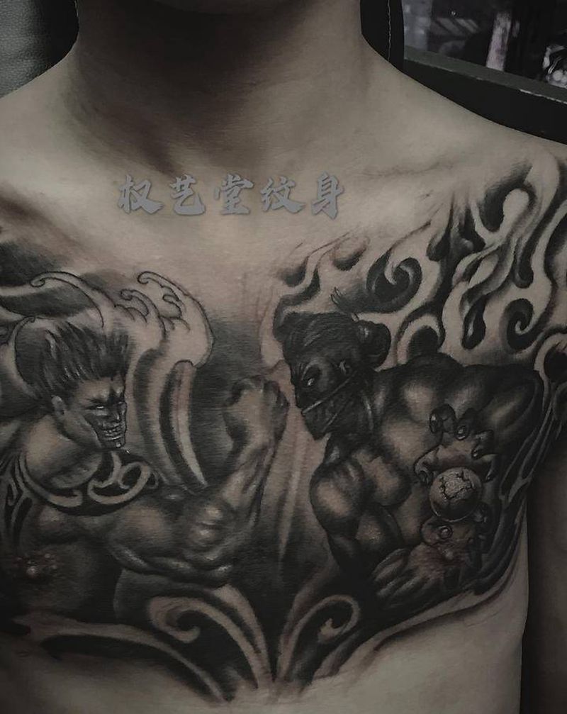 刀力量纹身图片_胸部纹身图案