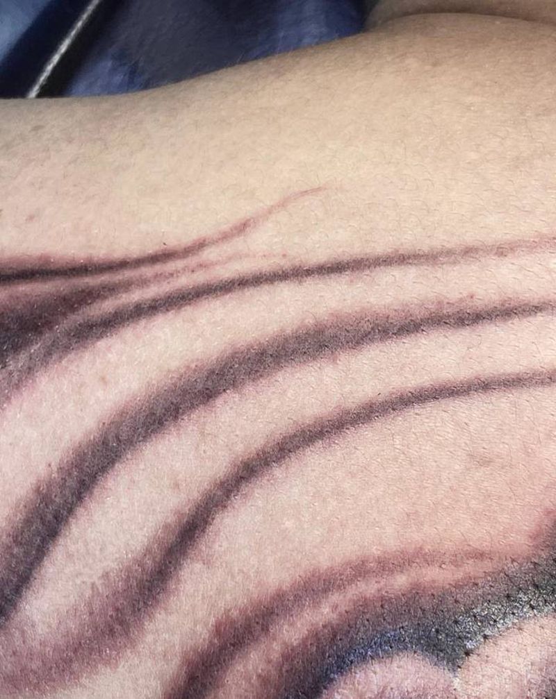 云雾纹身图片_背部新传统云雾纹身图案