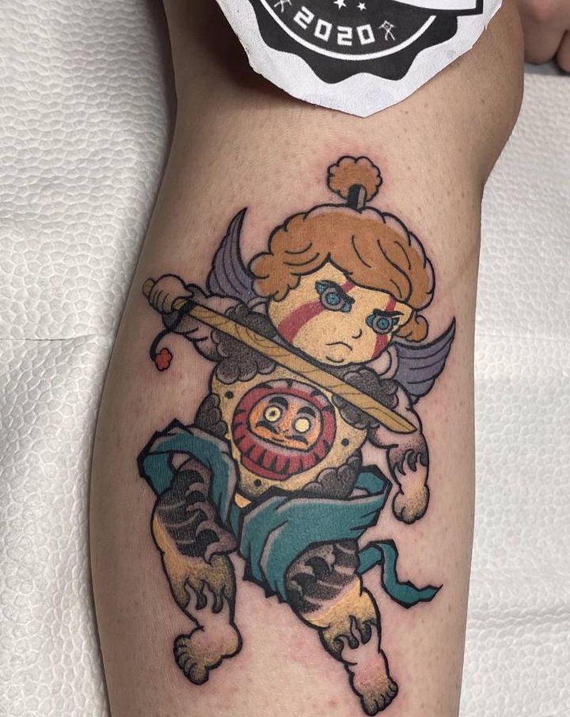 天使 阿童木纹身图片_腿部点刺老传统纹身图案