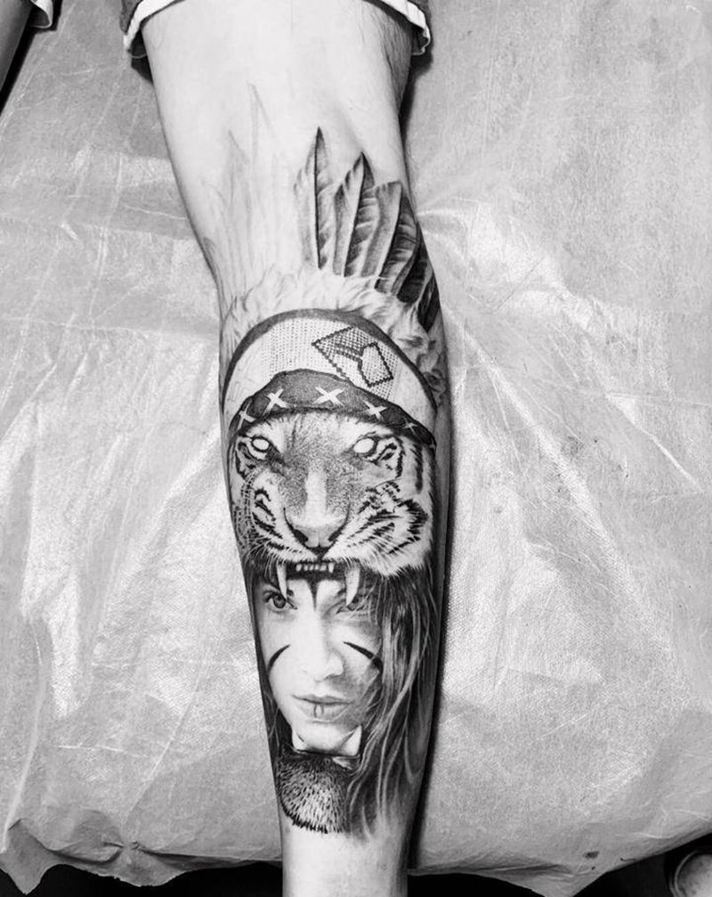 部落女郎纹身图片_腿部欧美写实纹身图案