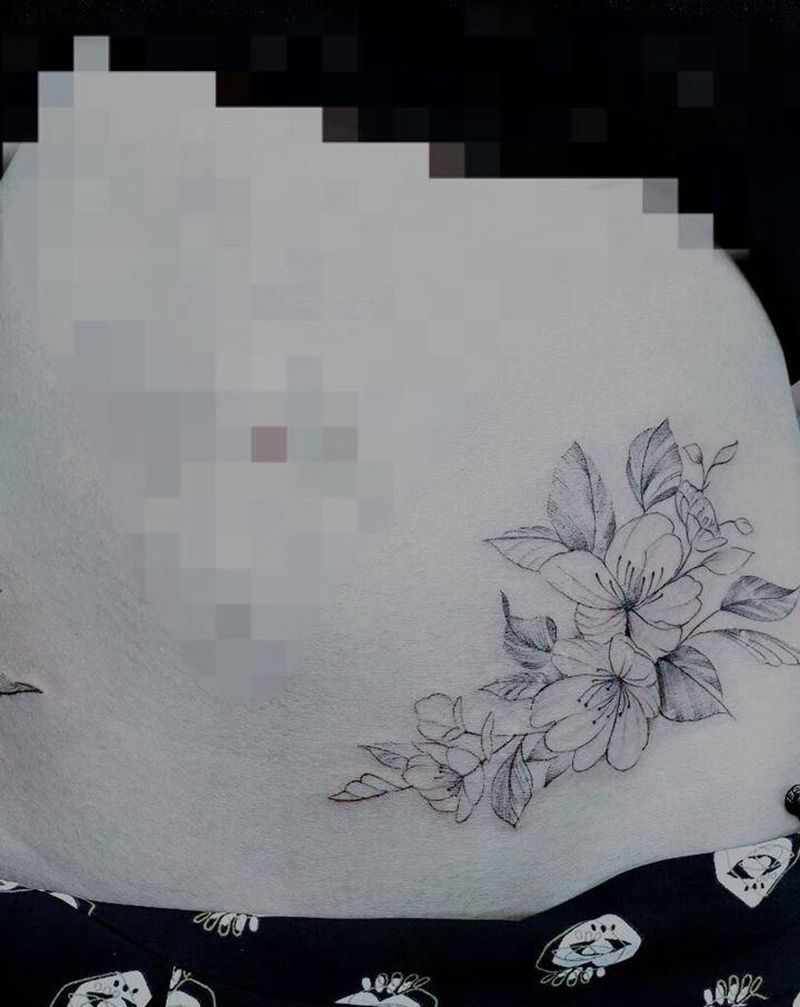 素花遮盖纹身图片_腹部纹身图案