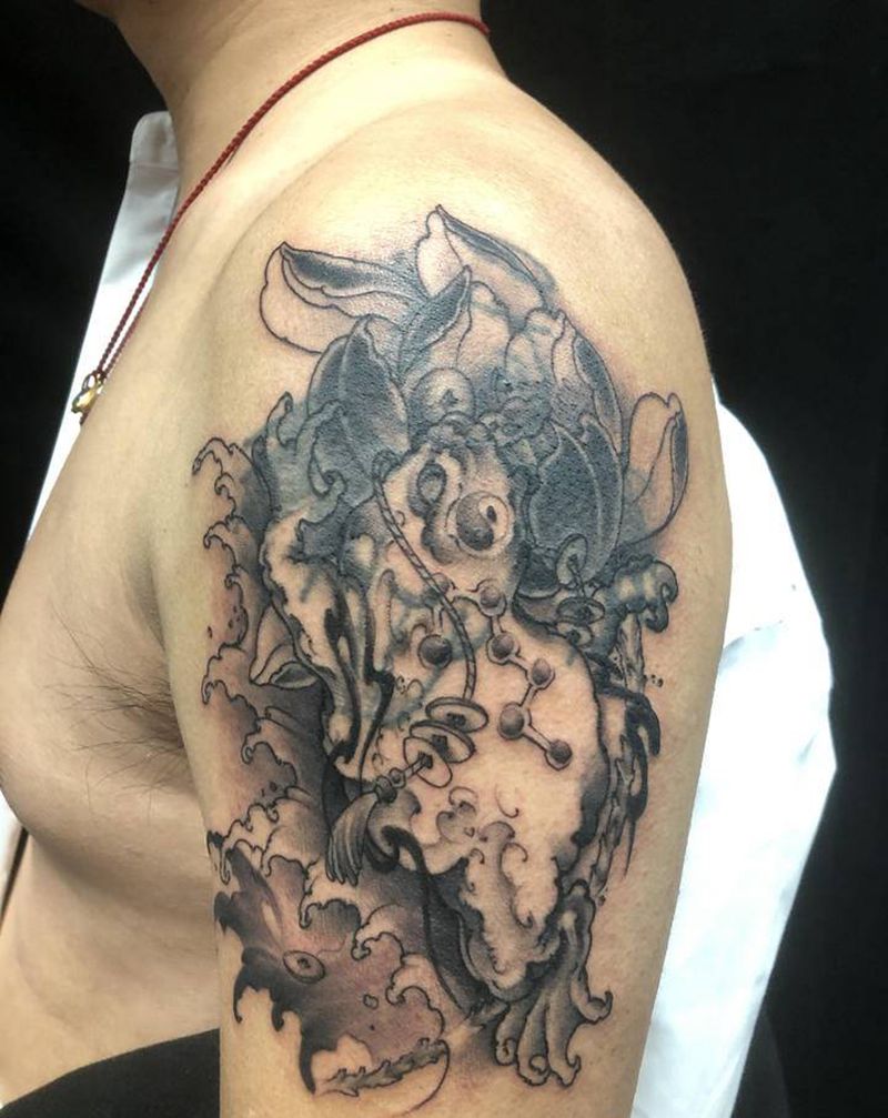 金蟾遮盖未完纹身图片_手臂新传统纹身图案