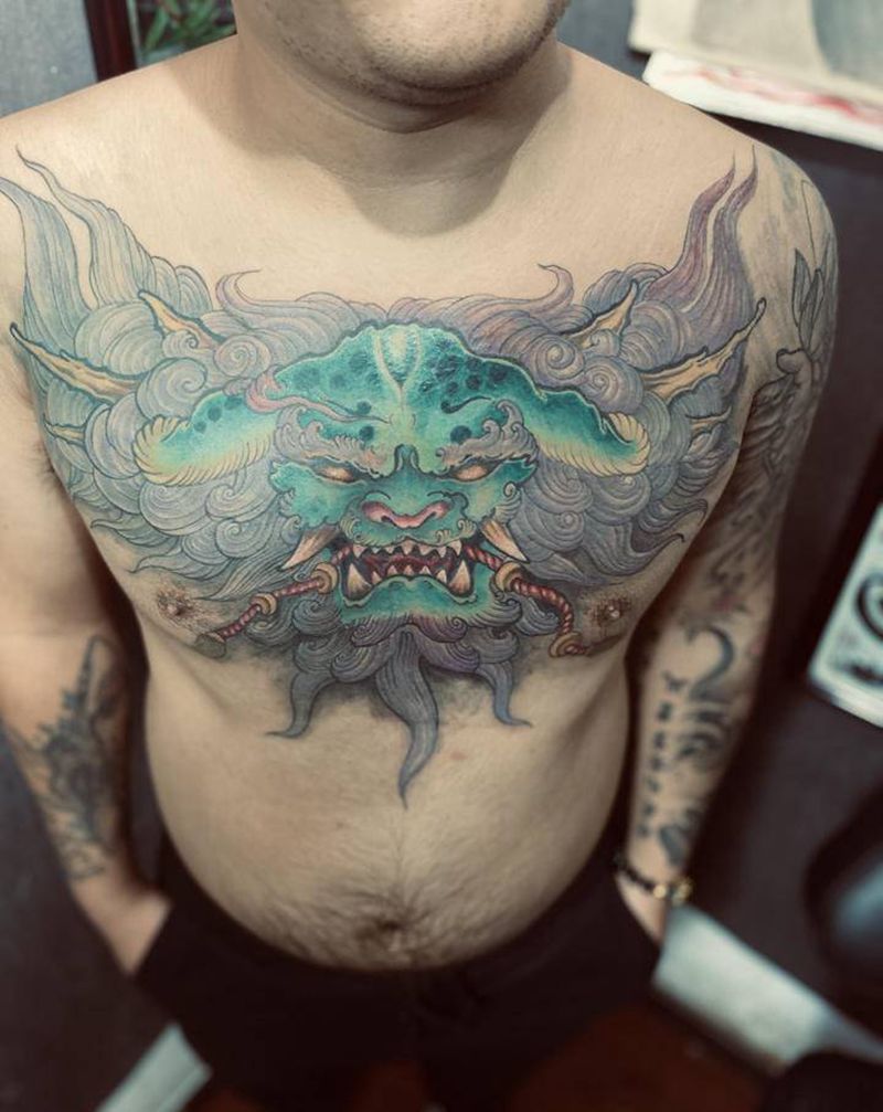 花胸唐狮纹身图片_胸部新传统不怒自威纹身图案