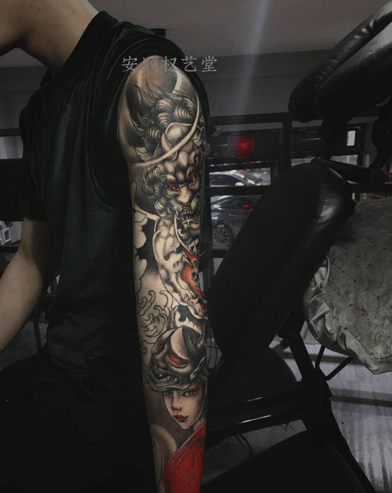 唐狮纹身图片_手臂新传统纹身图案