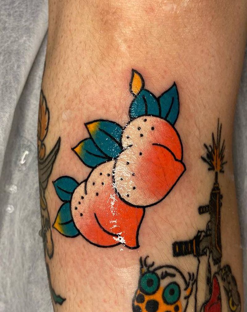 桃子纹身图片_腿部老传统桃子纹身图案