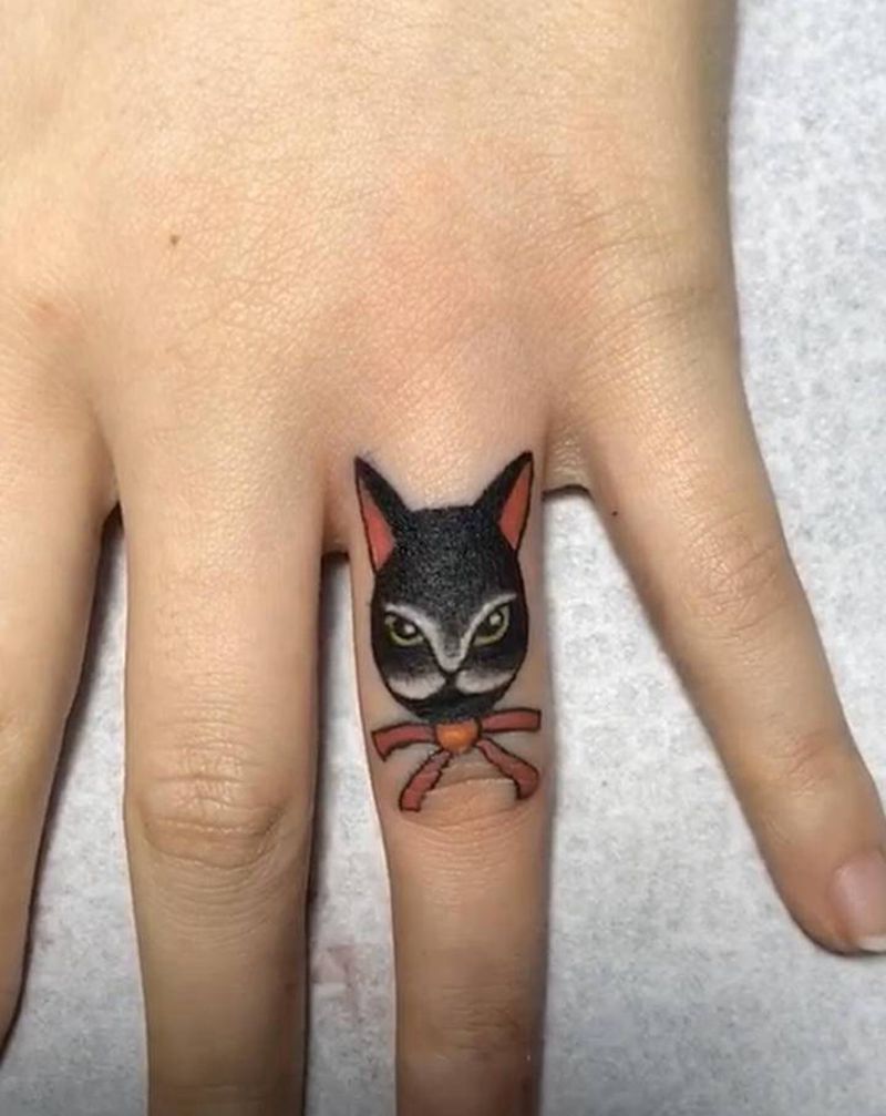 手指遮盖纹身图片_手部纹身图案