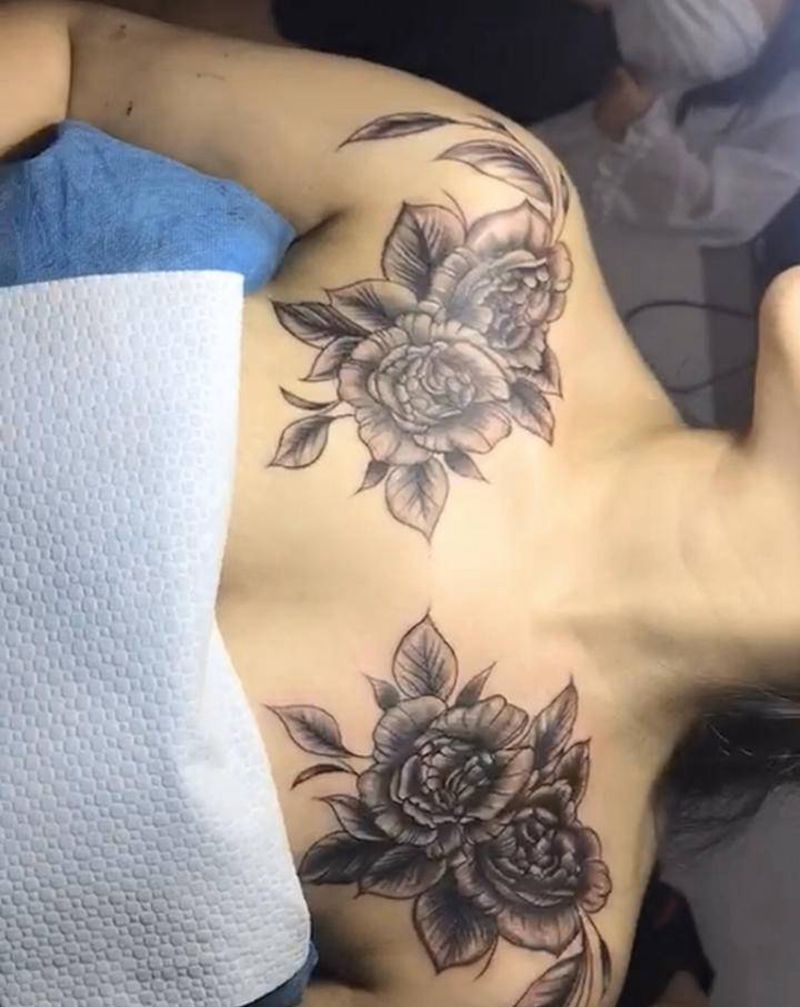 素花纹身图片_胸部纹身图案