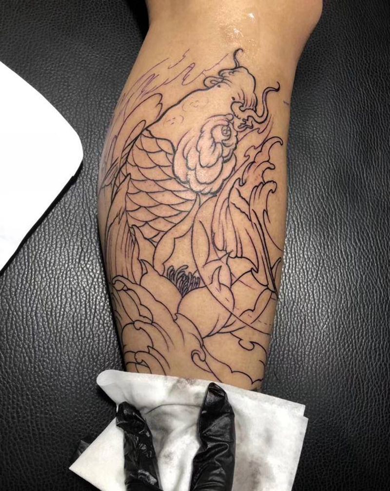 鱼纹身图片_腿部纹身图案