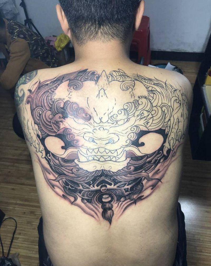 唐狮 未完待续纹身图片_背部纹身图案