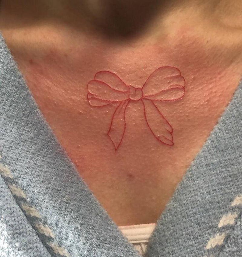 蝴蝶结纹身图片_胸部纹身图案