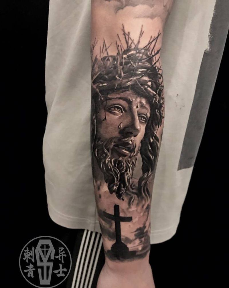写实耶稣蜡像质感纹身图片_手臂欧美写实耶稣纹身图案
