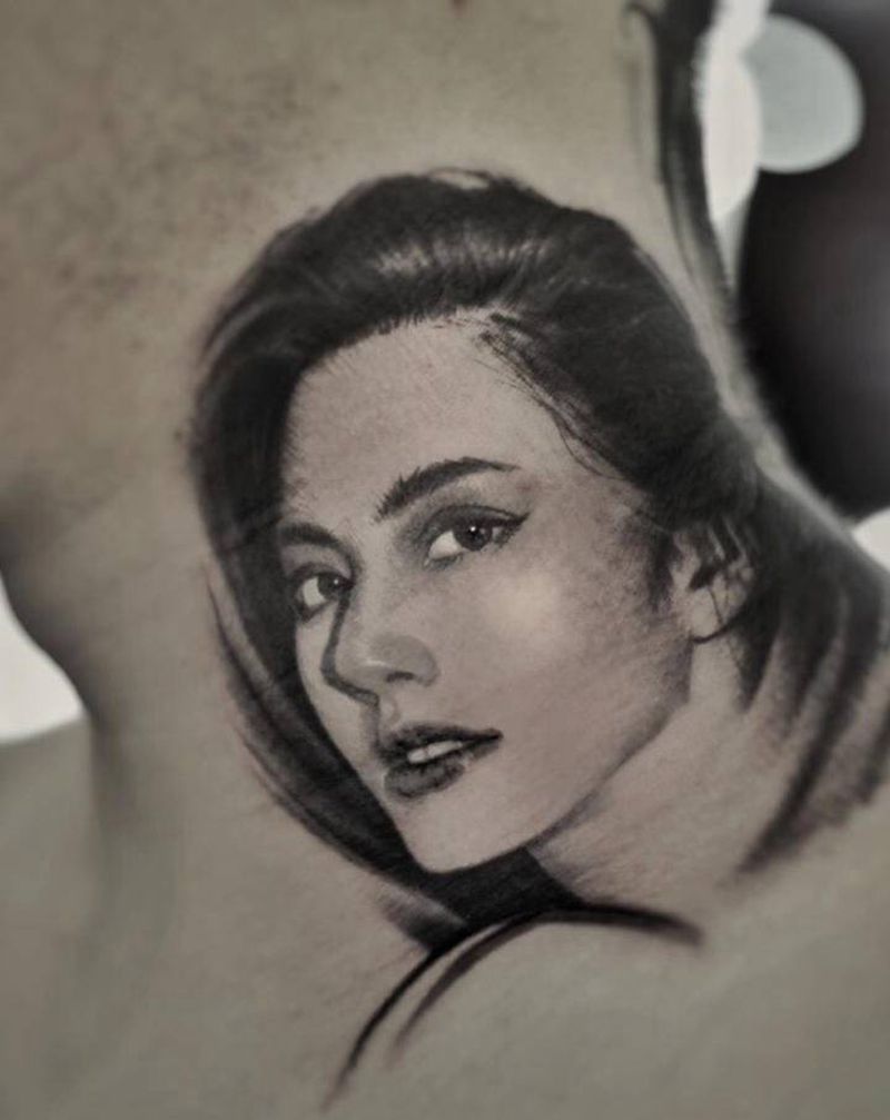 一个小写实纹身图片_颈部欧美写实昆明纹身图案