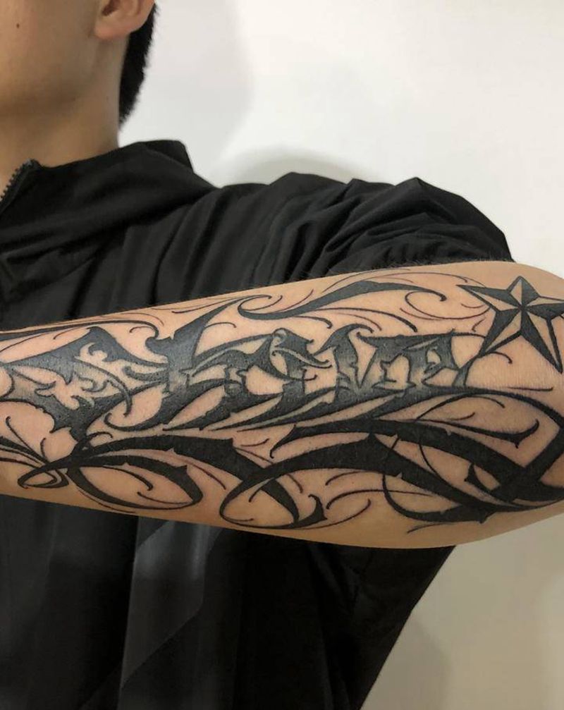 花体字修改纹身图片_手臂花体字纹身图案