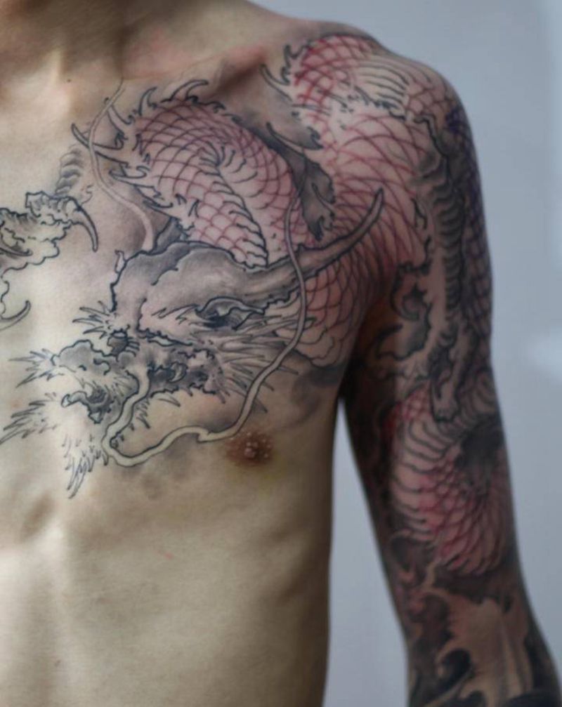 未完待续纹身图片_肩部手臂传统纹身图案