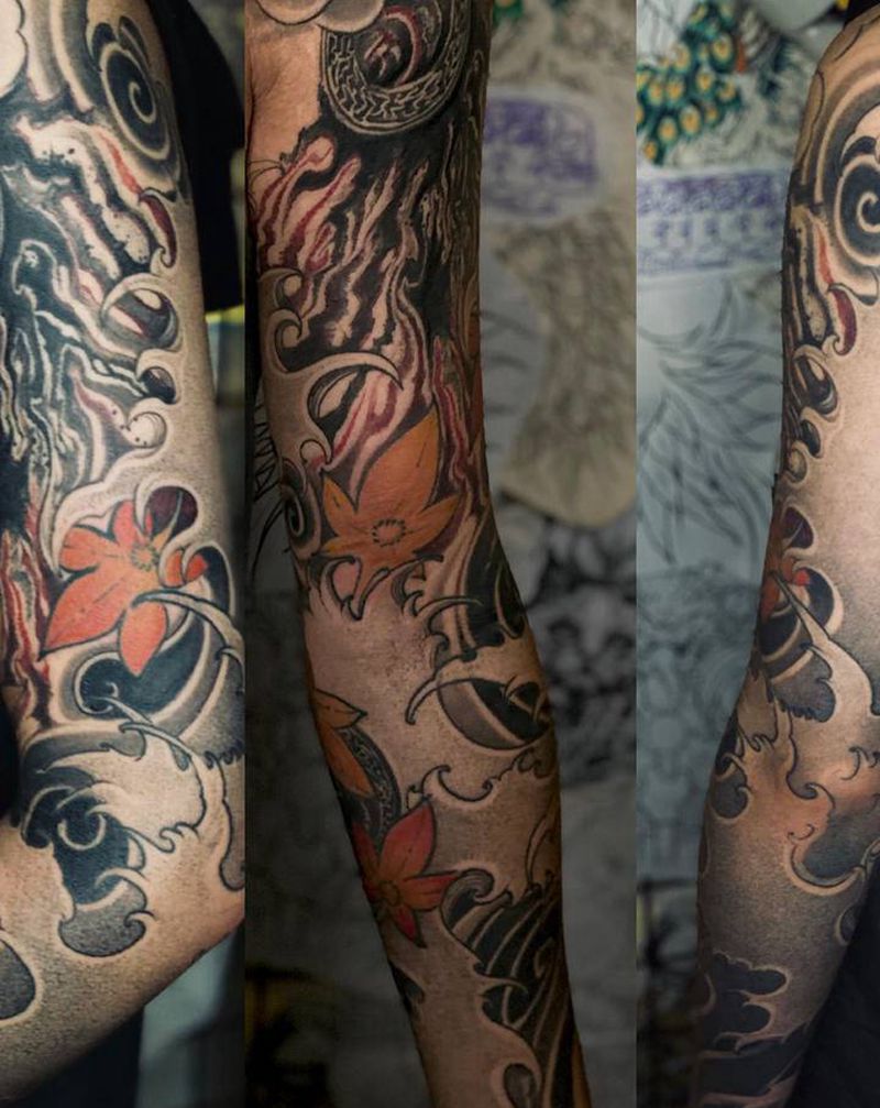 浪花臂纹身图片_点刺新传统纹身图案