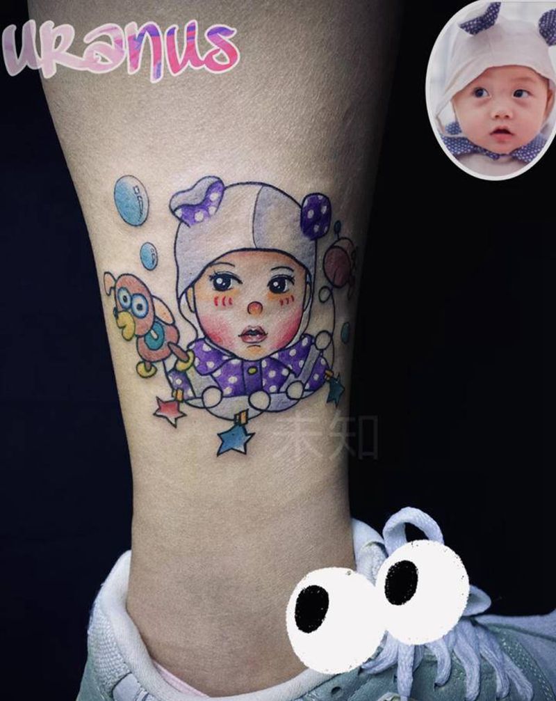 小王子和弹簧狗纹身图片_脚部卡通纹身图案