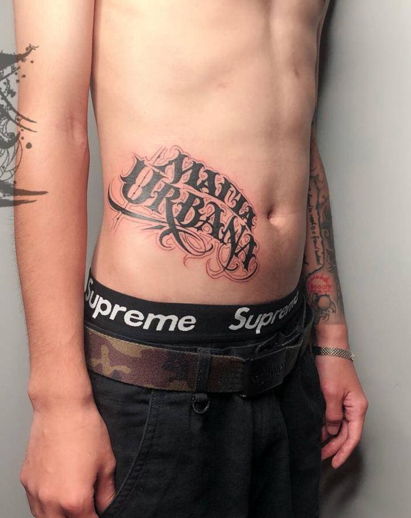 花体纹身图片_腹部纹身图案