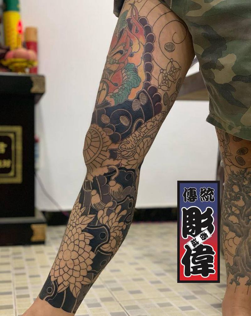 通体一点点进度纹身图片_腿部老传统纹身图案