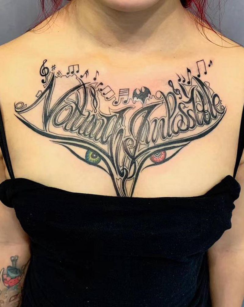 奇卡诺花胸纹身图片_胸部花体字纹身图案