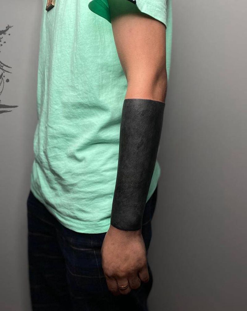 黑黑纹身图片_手臂纹身图案