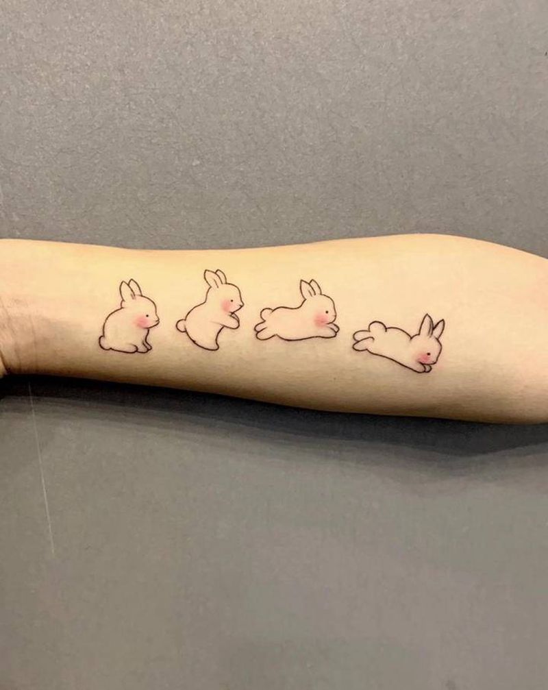 小兔子纹身图片_手部手臂图腾几何纹身图案