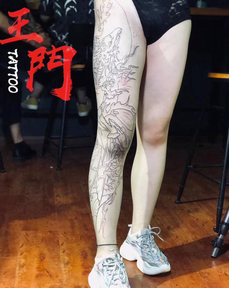 涅槃凤凰纹身图片_腿部新传统纹身图案
