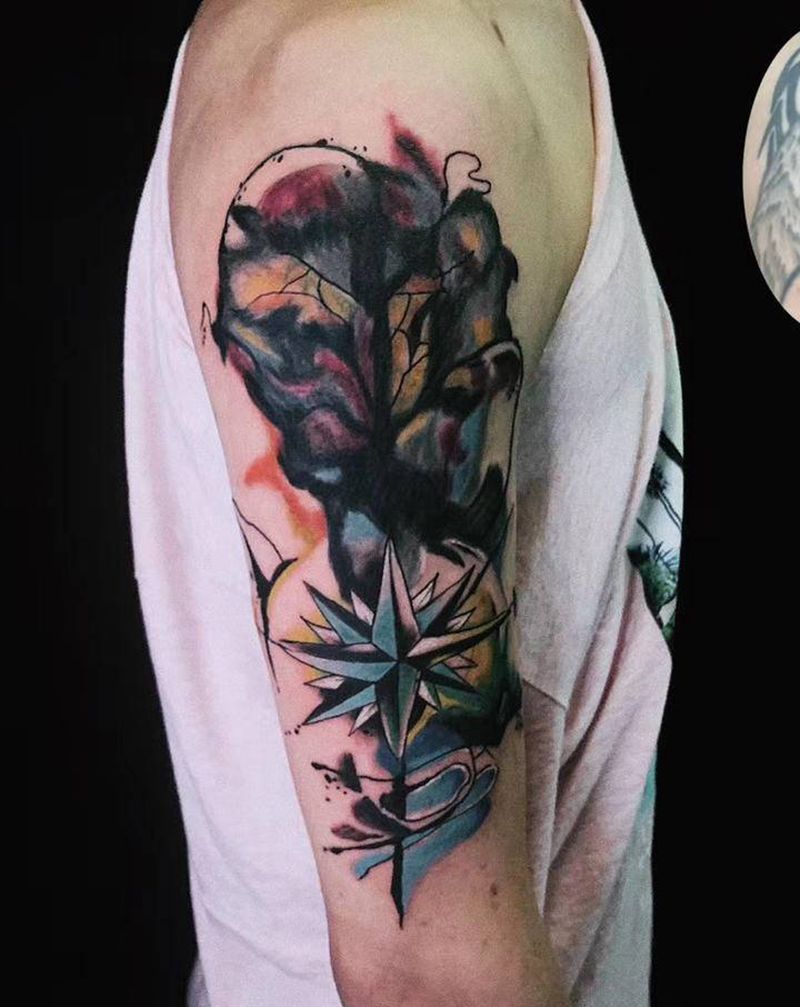 水彩指南针zhegai纹身图片_手臂水彩纹身图案