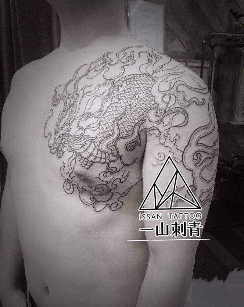 过肩麒麟纹身图片_肩部手臂图腾麒麟盗墓笔记张起灵纹身图案