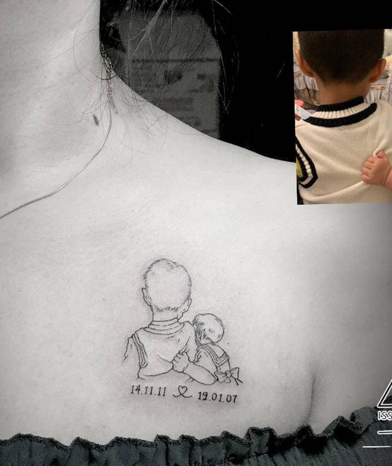 孩子们纹身图片_肩部胸部孩子家庭照片纹身图案