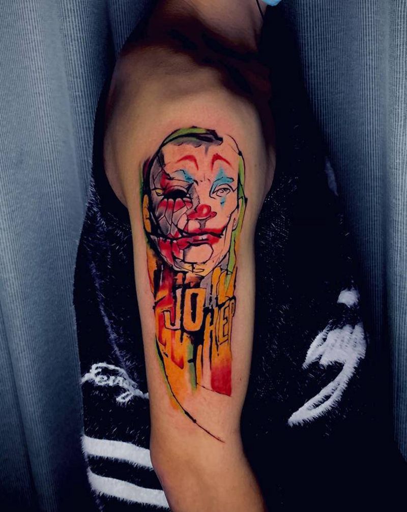 水彩小丑纹身图片_手臂水彩纹身图案
