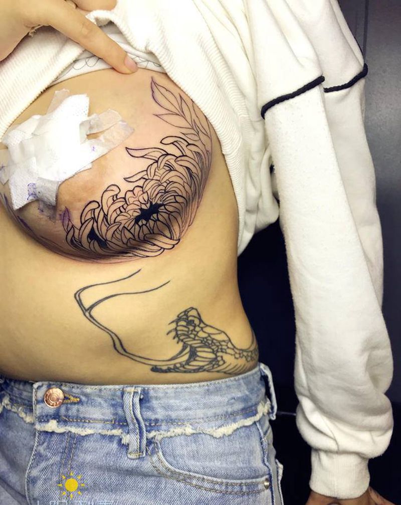 花胸未完纹身图片_胸部纹身图案