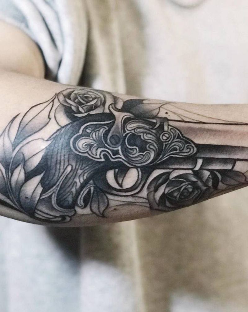 火枪纹身图片_手臂纹身图案