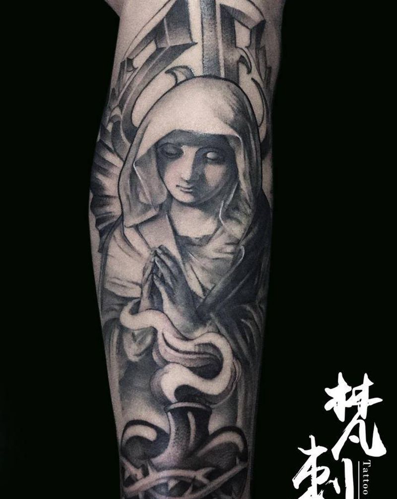 圣母纹身图片_腿部纹身图案