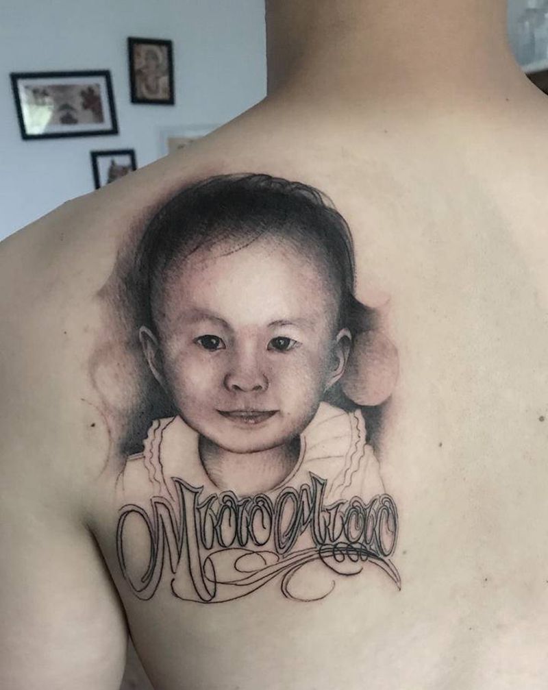 待续，未完纹身图片_背部纹身图案