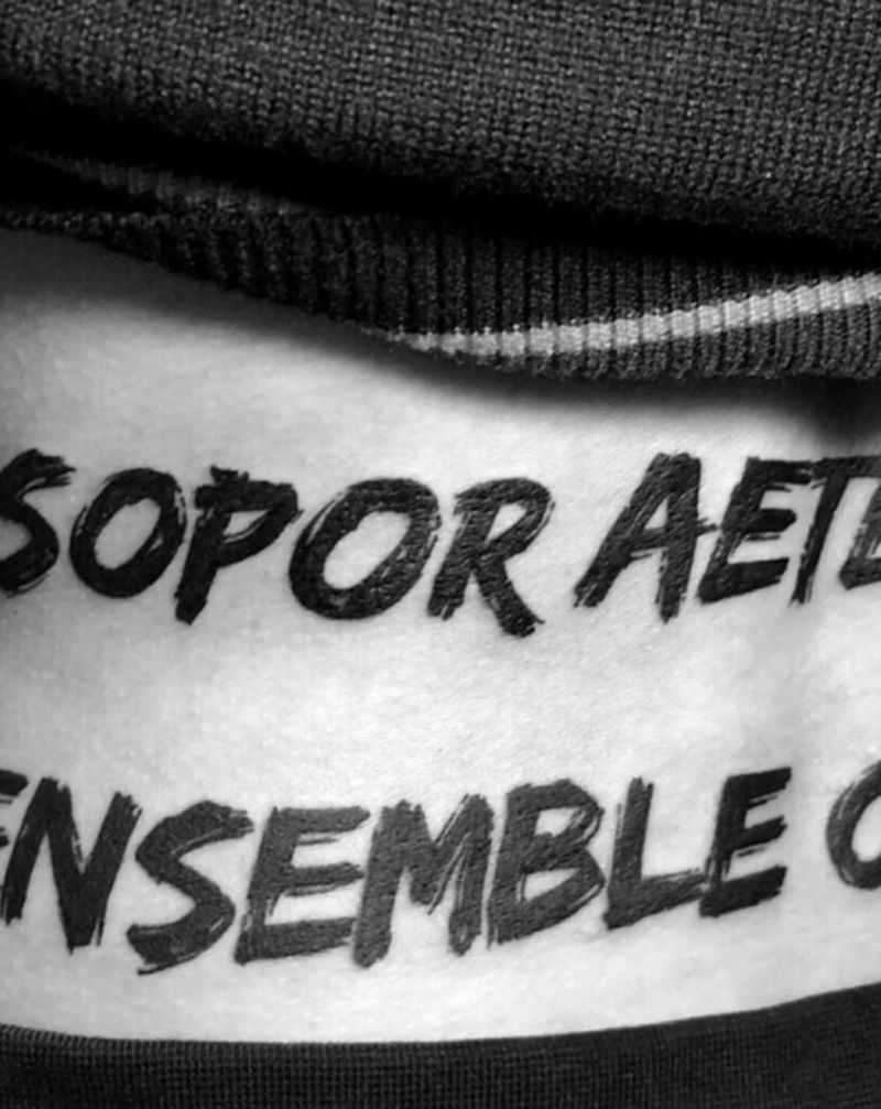 永恒沉睡纹身图片_腰部纹身图案