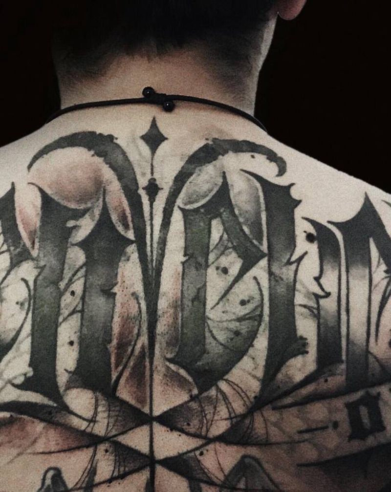 奇卡诺遮盖纹身图片_背部纹身图案
