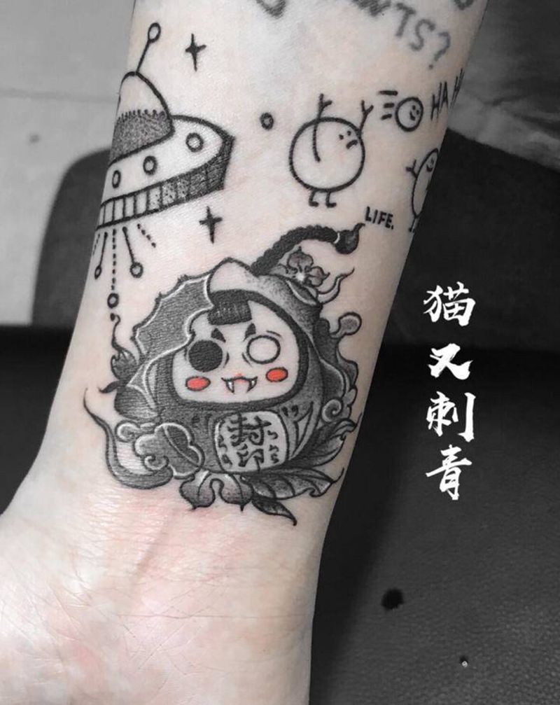 原创达摩纹身图片_手臂点刺纹身图案