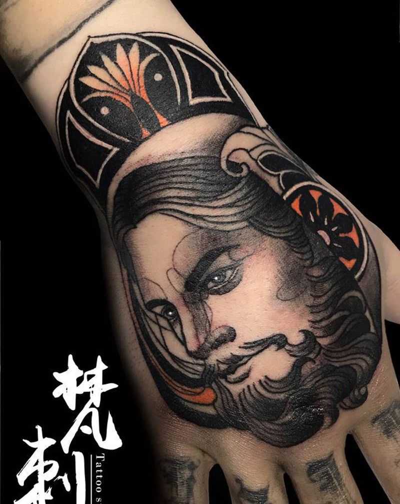耶稣手背纹身图片_手部纹身图案