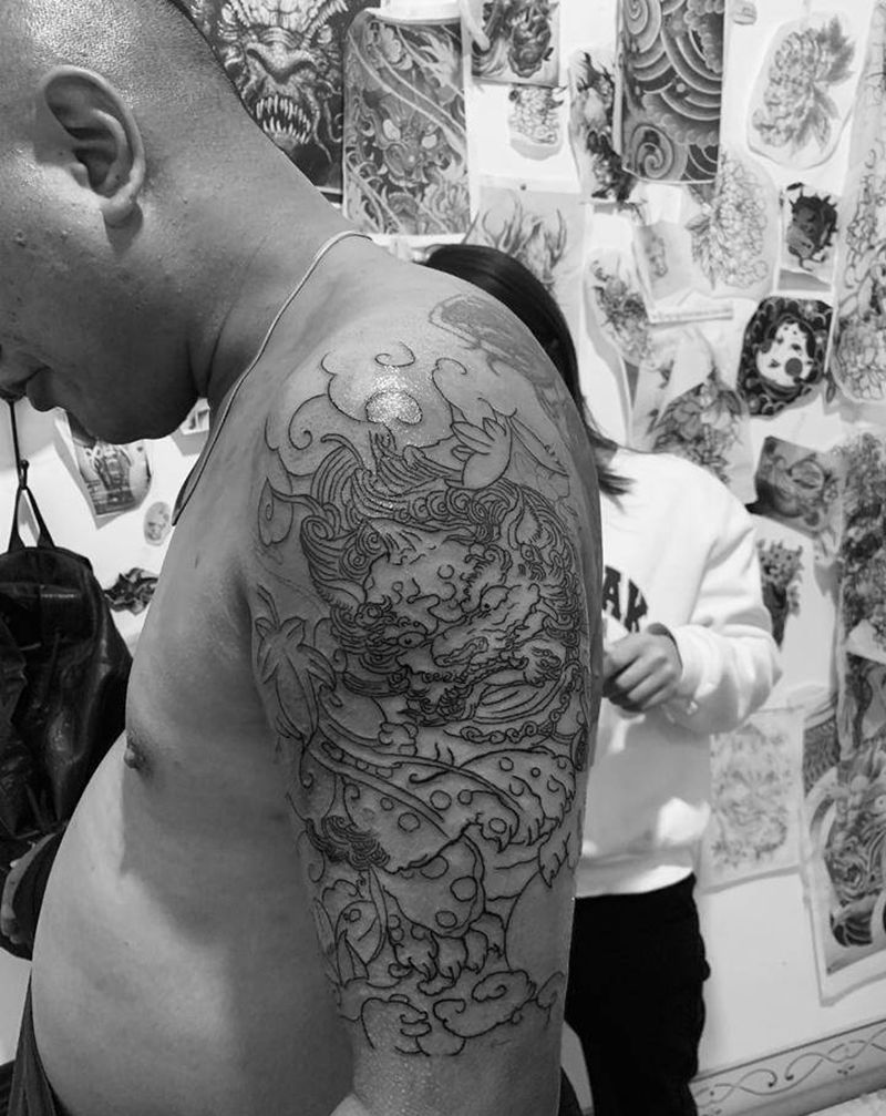 新传统唐狮纹身图片_新传统纹身图案