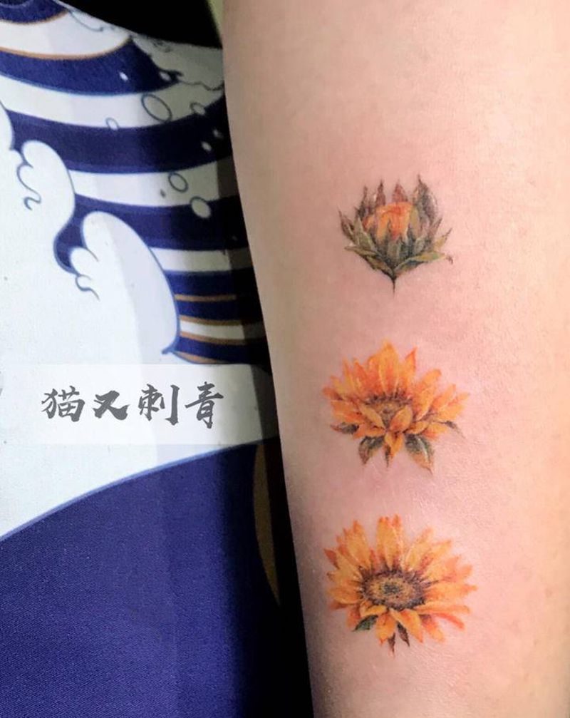 向日葵纹身图片_腿部纹身图案
