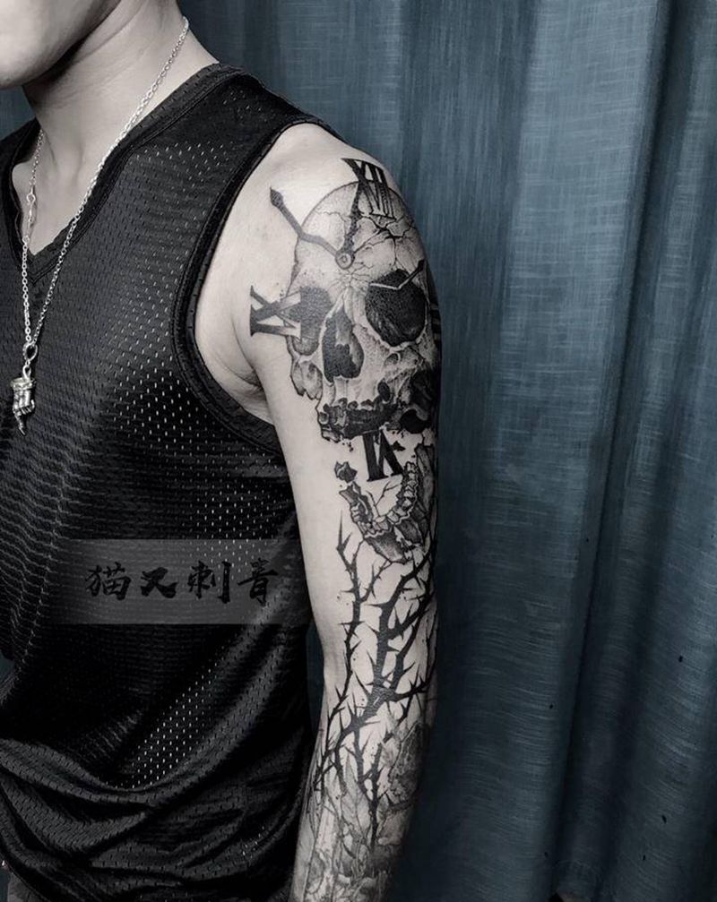 荆棘骷髅纹身图片_手臂点刺纹身图案