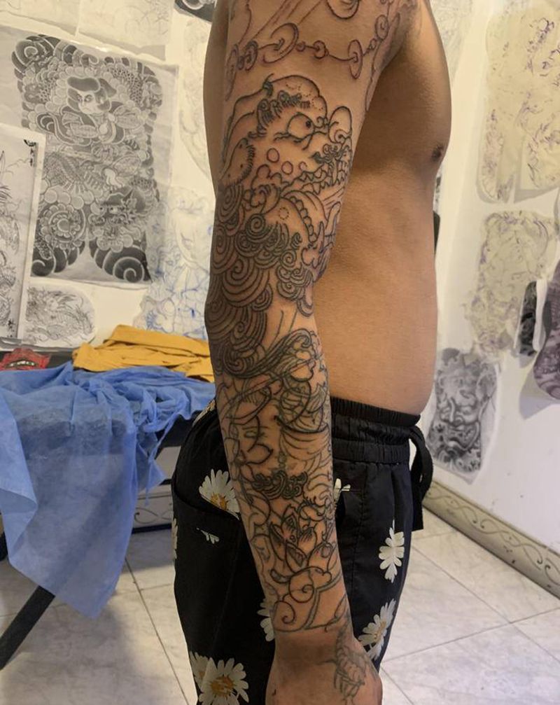 唐狮小臂遮盖纹身图片_老传统纹身图案