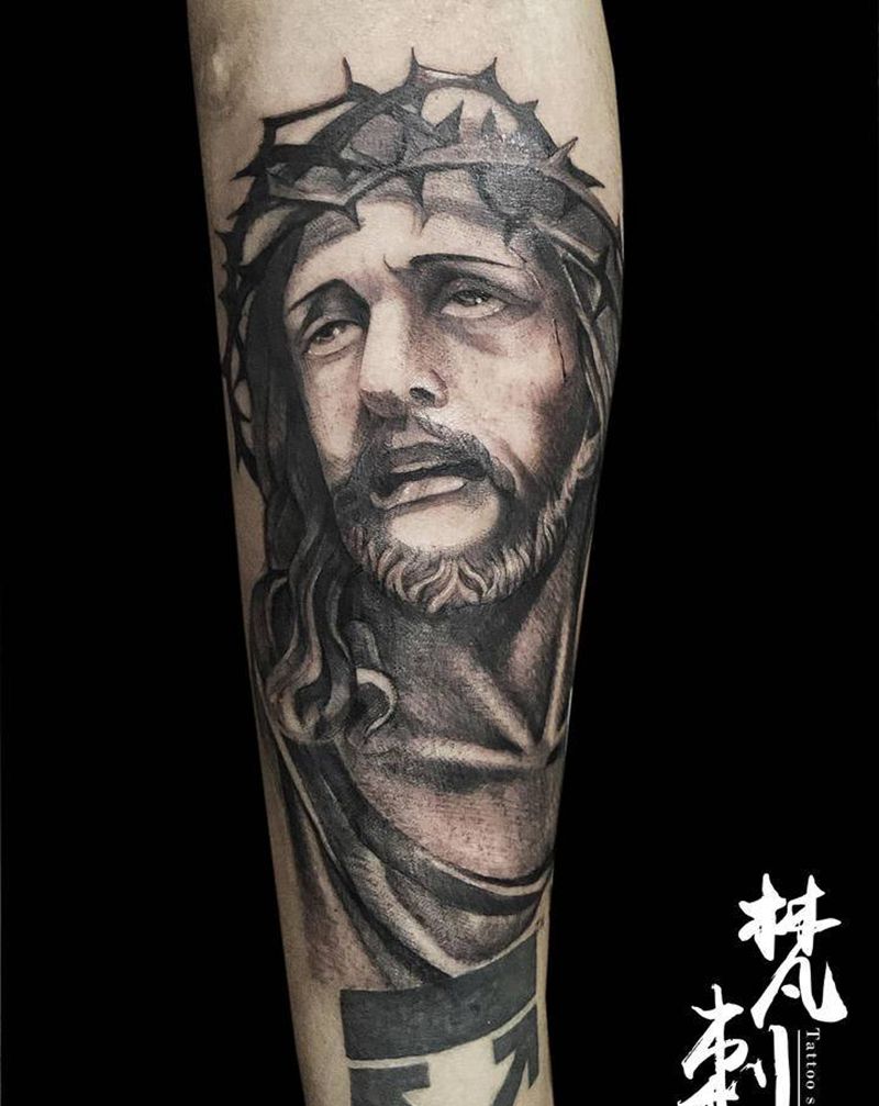 耶稣纹身图片_手臂纹身图案